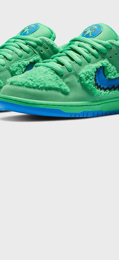 A pair of Grateful Dead Nike SB Dunk Lows shoes
